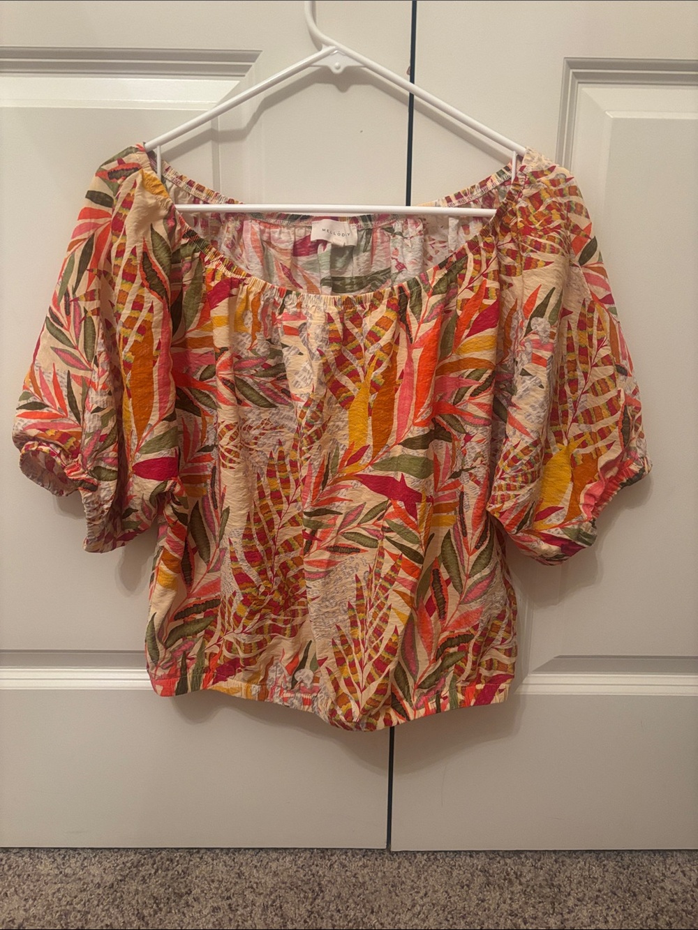 MELLODAY Cream Off-Shoulder Blouse with Pink, Orange & Green Leaf Print